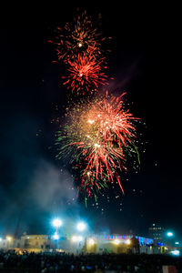 Firework display at night