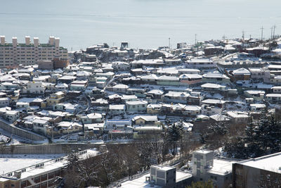 High angle view of townscape against sky during winter