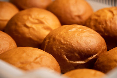 Cheeseburger or hamburger buns. freshly baked buns are on the tray