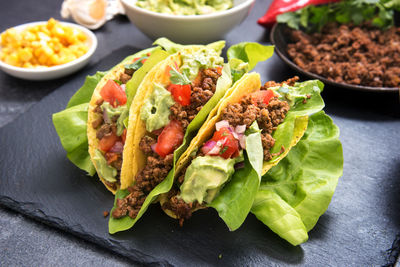 Close-up of tacos on table