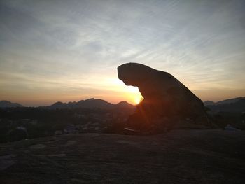 Scenic view of silhouette mountain against sky during sunset
