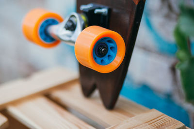 Close-up of skateboard on wood