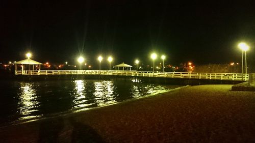 Illuminated street light at night