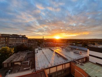High angle view of cityscape against sky during sunset