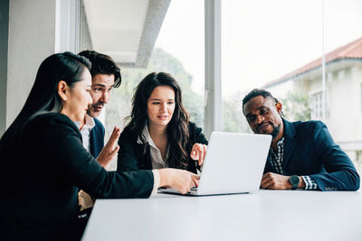 Business colleagues working at office