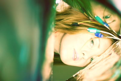 Close-up portrait of smiling young woman