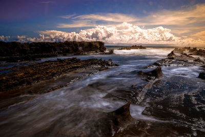 Scenic view of sea against sky during sunset