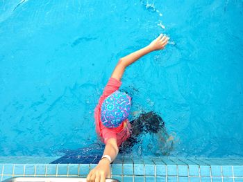 Girl swimming in pool