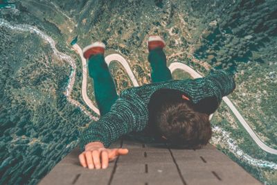 High angle view of boy playing with water