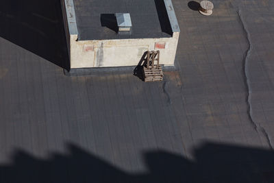 Black roof view from above . rooftop covered by ruberoid