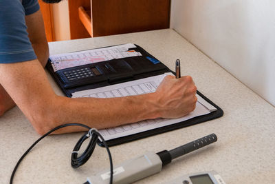 Man using laptop on table