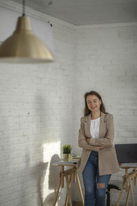 Happy businesswoman in office.  beautiful manager smiling, working on financial marketing projects