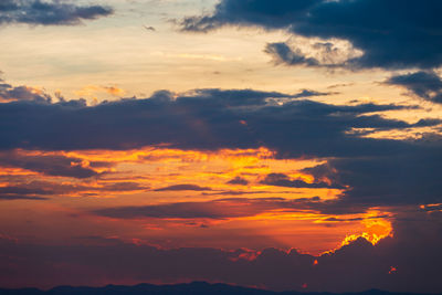 Low angle view of dramatic sky during sunset