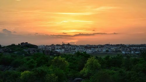 View of cityscape against sky during sunset