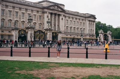 Group of people in front of historical building