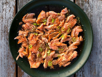 High angle view of meat in container on table