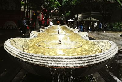 Fountain in city at night