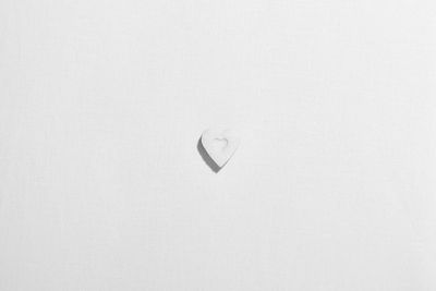 Close-up of heart shape on white background