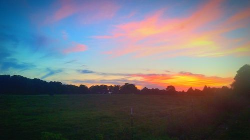 Scenic view of landscape against sky during sunset