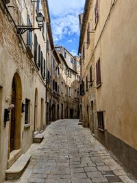 Alley amidst buildings in town