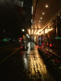 Illuminated railroad station at night