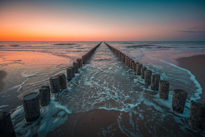 Scenic view of sea against sky during sunset