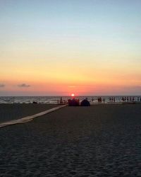 Scenic view of sea at sunset