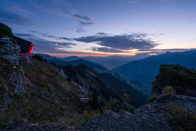 Scenic view of mountains against sky during sunset