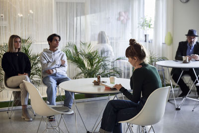 People sitting in waiting room