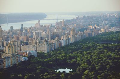 High angle view of buildings in city against sky