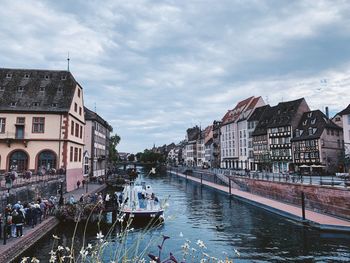 Group of people boarding a boat in strasbourg 