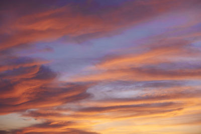 Low angle view of dramatic sky during sunset