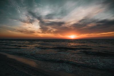 Scenic view of sea against sky during sunset