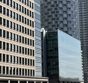 Low angle view of modern buildings in city