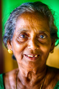 Close-up portrait of smiling mid adult man