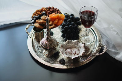 High angle view of fruits in glass on table