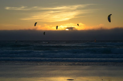 Scenic view of sea against sky during sunset