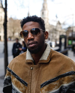 Portrait of young man wearing sunglasses