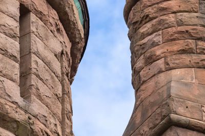 Low angle view of old ruins against sky