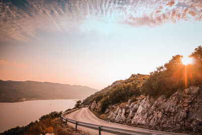 Scenic view of mountains against sky during sunset