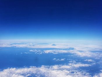 Aerial view of clouds over blue sky