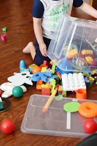 Boy playing with toy on table