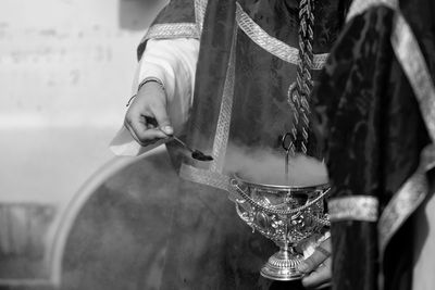 Close-up of man holding drink