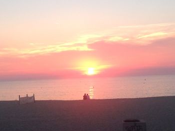 Scenic view of sea at sunset