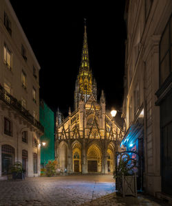 Illuminated buildings in city at night