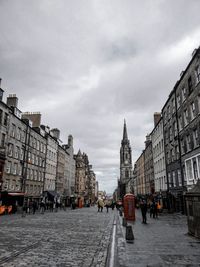 View of buildings against cloudy sky