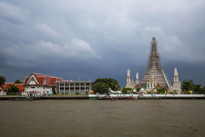 Buildings in city against sky