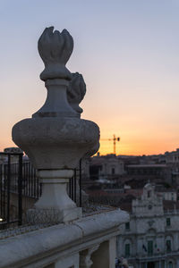 Close-up of sculpture on railing