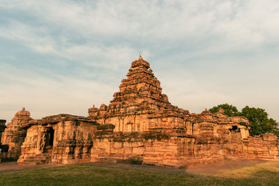 Low angle view of temple against sky during sunset