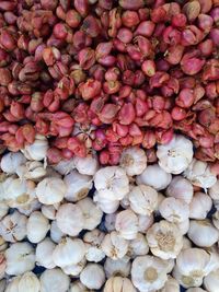 Full frame shot of onions for sale at market stall